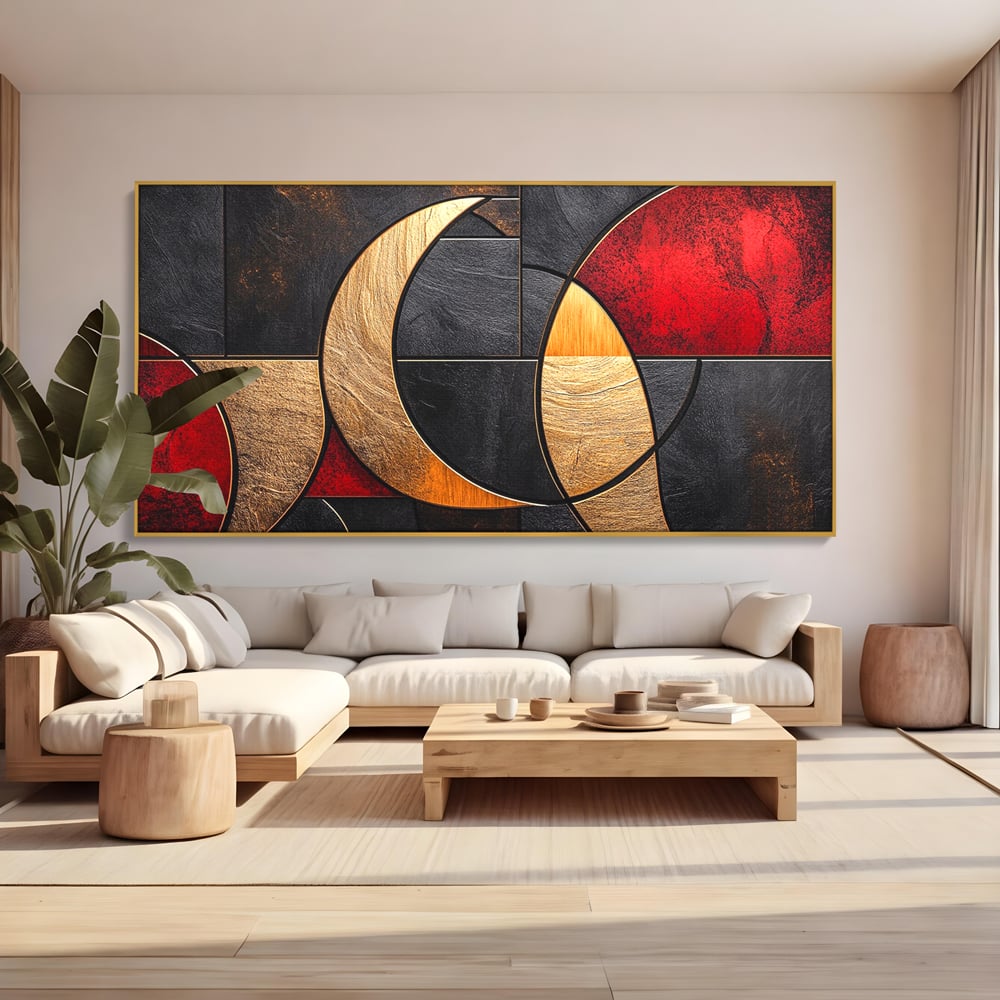 Tablou canvas cu tablou canvas cu forme geometrice aurii si rosii, in rama de aluminiu auriu, pe perete intr-un living
